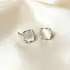 Pendientes minimalistas de ojo de gato con pasador de plata S999, Pendientes versátiles inspirados en la dopamina, Accesorios populares para las orejas, Regalo al por mayor para novia