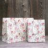 Bolsa de papel portátil en stock, bolsa de compras de regalo de mano con patrón de flores de estilo Ins simple, bolsa de regalo pequeña con logotipo imprimible
