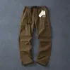 Exportar a Europa y América pantalones casuales impermeables para ganado al aire libre para hombre corte de comercio exterior etiqueta fina primavera y verano montañismo utilitarios pantalones de secado rápido