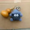 Piel sintética de visón Muñeca Bola de Carbón Pequeña Colgante Muñeca de Pareja Llavero para Bolso Llavero para Mochila Versátil y Linda