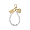 Colgante de Figura Cuadrada Amor Vintage Lanyard para Teléfono Móvil Cadena de Mano Perla Estilo Pequeño Fragante Estilo INS para Mujer Antiperdida