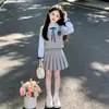 Conjunto de Dos Piezas Otoño Nuevo Estilo Universitario para Niñas: Conjunto de falda plisada y blusa de dos piezas falsas para niñas pequeñas a principios de otoño