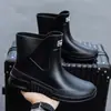 Botas de lluvia para hombres y mujeres, zapatos impermeables para cocina y obras de construcción, botas cortas de goma cálidas de algodón polar engrosado para exteriores, venta al por mayor de botas de lluvia