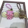 Popular Llavero Colgante Pastel de la Fortuna Princesa Dorada Colgante de Lista Dorada Bolso Regalo de Paz y Alegría