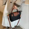 Bolsa tote de grande capacidade para trabalhadores de escritório, novo modelo 2026 bolsa de ombro feminina, bolsa de bolinho, bolsa de mão versátil e ultraleve