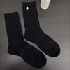 Nuevos calcetines para mujer de primavera y verano, calcetines de rejilla con patrón floral oscuro de botones, calcetines de tubo hueco, calcetines de pila, color sólido, calcetines finos estilo coreano