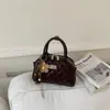 2026 Verão Novo Coreano Nicho Acolchoado de Diamante Alça de Corrente Bolsa Bowling Feminina Elegante Ombro Transversal Bolsa Feminina