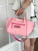 Bolso tote de lona de gran capacidad para mujer, nicho transfronterizo, nuevo bolso de mano y bandolera casual ligero para el verano de 2026