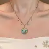 Colar de borla com contas florais azuis de alta qualidade para mulheres, um choker único para usar em camadas, corrente de clavícula chique e versátil