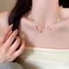 Collar de acero de titanio con lazo de alta calidad para mujer, cadena de clavícula de lujo con luz Joker, joyería explosiva roja de red al por mayor