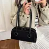 Bolsa de boliche, bolsa de ombro, bolsa versátil de nicho feminina para outono, casual, para o dia a dia, bolsa de ombro estilo retrô novo, moda 2026