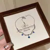 Artesanía Antigua del Vidrio Encaje Serie Gota de Agua Azul Collar con Borla Retro Francés Collar de Zafiro