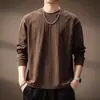 Camiseta de manga larga con textura de alta gama italiana para hombre, nuevo estilo primavera y otoño 2026, top holgado casual de manga larga con cuello redondo