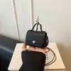 Bolso de mano mini sencillo de modelo nuevo 2026 transfronterizo para mujer, disponible en múltiples colores, bolso de hombro portátil, bolso cruzado versátil