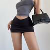 Saia Sexy Spice Girl em V de Cintura Baixa Preta Justa Modeladora de Quadril Saia Curta Estilo Americano Saia Evasê Slim Elástica para Mulheres