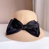 Estilo Hepburn Lazo Grande Moda Cubierta de Lámpara Sombrero de Invierno para Mujer Todo Combinación Casual Lana Sombrero de Pescador Elegante Elegante Sombrero de Cubo