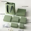 Caja de joyería de lujo ligero con asa de perla texturizada y diseño acanalado, textura de caja dura, adecuada para pendientes, pulseras y empaque de regalo; disponible en stock