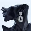 Aretes irregulares repujados Europa y Estados Unidos personalidad geométricos cuadrados metal aretes transfronterizos nuevos al por mayor A982