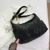 Bolsa Grande Capacidade Feminina 2024 Nova Cor Sólida Têxtil Nicho Verão Versátil Bolsa de Ombro Transversal Feminina Bolsa de Dumpling