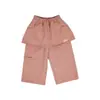 Ropa Infantil Nuomi Wanzi 2026 Otoño Pantalones Casuales de Algodón Puro para Niñas con Solapa Trasera y Etiqueta Parcheada, Pantalones Rectos, Pantalones Falda para Niños al por Mayor