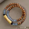 Pulseira de contas de oração budista de madeira crua natural, vendida a quente, sândalo dourado, sândalo Barbie, pulseira colecionável para homens e mulheres, fornecimento para live-stream