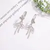 Brincos de Laço Cruzado Estilo Coreano para Mulheres, Luxo Leve, Brincos de Alta Qualidade, Brincos de Design de Nicho Atacado