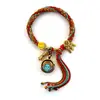 Xizang thangka corda de mão oito deuses padroeiros cinco mestres mãe verde thangka pulseira tecida à mão estilo Xizang pulseira de reencarnação