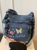 Bolsa Quadrada Pequena Minimalista Fashion e Única Modelo Novo Verão 2026 Porta-Moedas e Celular Bolsa Transversal de Brim Bordada de Alto Valor