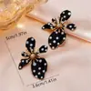Pendientes de Botón de Lunares Florales Blanco y Negro Clásicos Franceses Versátiles Moda Transfronteriza Europea y Americana Accesorios de Joyería para Mujer