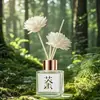 Aromaterapia para uso doméstico, adecuada para dormitorios y baños de hotel, proporcionando fragancia duradera y eliminación de olores con aceites esenciales de gardenia y osmanthus en un difusor de varillas.