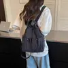 Mochila ligera estudiante gran capacidad doble hombro bolsa nicho estilo coreano 2026 Otoño nuevo simple ins bandolera mujer