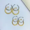 Brincos Argola Bicolor Dourado e Prateado Estilo Minimalista, Disponíveis em Tamanhos Grande e Pequeno, Brincos C-Shaped de Superfície Lisa, Brincos Simples e Versáteis para o Dia a Dia