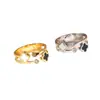 Anillo Doble de Trébol de Cuatro Hojas Blanco y Negro Acero de Titanio Diamante Micro-engastado Chapado en Oro Anillo Abierto