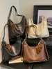Bolso de hombro vintage nuevo transfronterizo 2026, bolso de mano de nicho de gran capacidad, bolso cruzado simple y elegante para el día a día