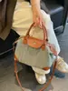 Bolso pequeño de alta gama transfronterizo para mujer, estilo verano 2026, moderno y sencillo, bolso tipo empanada de nicho, bolso versátil para hombro y cruzado