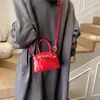 Bolsos de Moda Europeos y Americanos Transfronterizos para Mujer, Bolsos de Mano Brillantes de Nicho, Mini Bolsos Cruzados Nuevos de Primavera de Charol para Niños