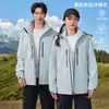 Nueva chaqueta outdoor de estándar nacional para hombres y mujeres, abrigo de senderismo tres en uno a prueba de viento e impermeable, ropa para montañismo y esquí con logotipo personalizado