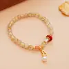 Pulsera de Cristal Dorado Natural Nuevo Pulsera de Cristal Amarillo de Calabaza China de Cinco Artículos Piedra de la Fortuna Regalo para Novia