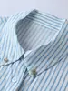 Camisa de Verano 2026 Rayas Azul Suave y Blanco con Adornos Metálicos, Cuello de Solapa, Mangas Largas, Nueva Elegante Camisa para Viajar al Trabajo