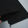 Bolsa de tela no tejida negra engrosada con cordón y logo personalizado, adecuada para empacar, viajar, secar ropa y como bolsa de regalo