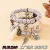 Pulsera con Colgante de Borla de Ala Redonda Estilo Bohemio Transfronterizo Europeo y Americano Pulsera de Cuerda Elástica Multicapa con Cuentas