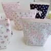 Bolsa de maquiagem de alta qualidade, pequena, com bordado de laço floral de algodão, bolsa de armazenamento para viagem, envelope vermelho de boca, atacado de fábrica