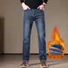 Jeans de Invierno Forrados de Polar Negro y Gris para Hombre 2026 Nueva Marca de Moda Pantalones Largos Elásticos Versátiles de Moda de Negocios