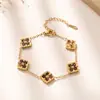 Pulsera de flor de cuatro hojas en forma de diamante, pulsera de nácar de doble cara, electrochapada, moderna y versátil, joyería para mujer al por mayor