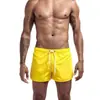 Pantalones cortos de playa de verano para hombre transfronterizos, pantalones cortos casuales holgados, pantalones cortos deportivos de tres cuartos para correr, moda de color liso, secado rápido, transpirables
