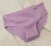 A001 ropa interior para mujer estudiantes chica coreana sexy de tiro bajo fabricantes de ropa interior para niñas calzones de color liso