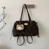 Bolso de Mano tipo Tote Retro Simple de Gran Capacidad para Mujer 2025 Invierno Nuevo Estilo Ropa de Trabajo Versátil Diario Mochila de un Hombro