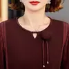 Camisetas de otoño para mujeres de mediana edad y mayores, nuevo modelo 2026, blusa básica de manga larga holgada para cubrir el abdomen para madres, primavera y otoño