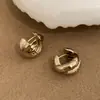 Pendientes de cruz dorados para café, retro a la moda, lujo ligero, de alta gama, diseño simple, único, de nicho, versátil para mujer