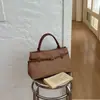 Bolsa feminina de grande capacidade, nova tendência 2026 outono casual moda alta qualidade bolsa de mão para trabalho e deslocamento